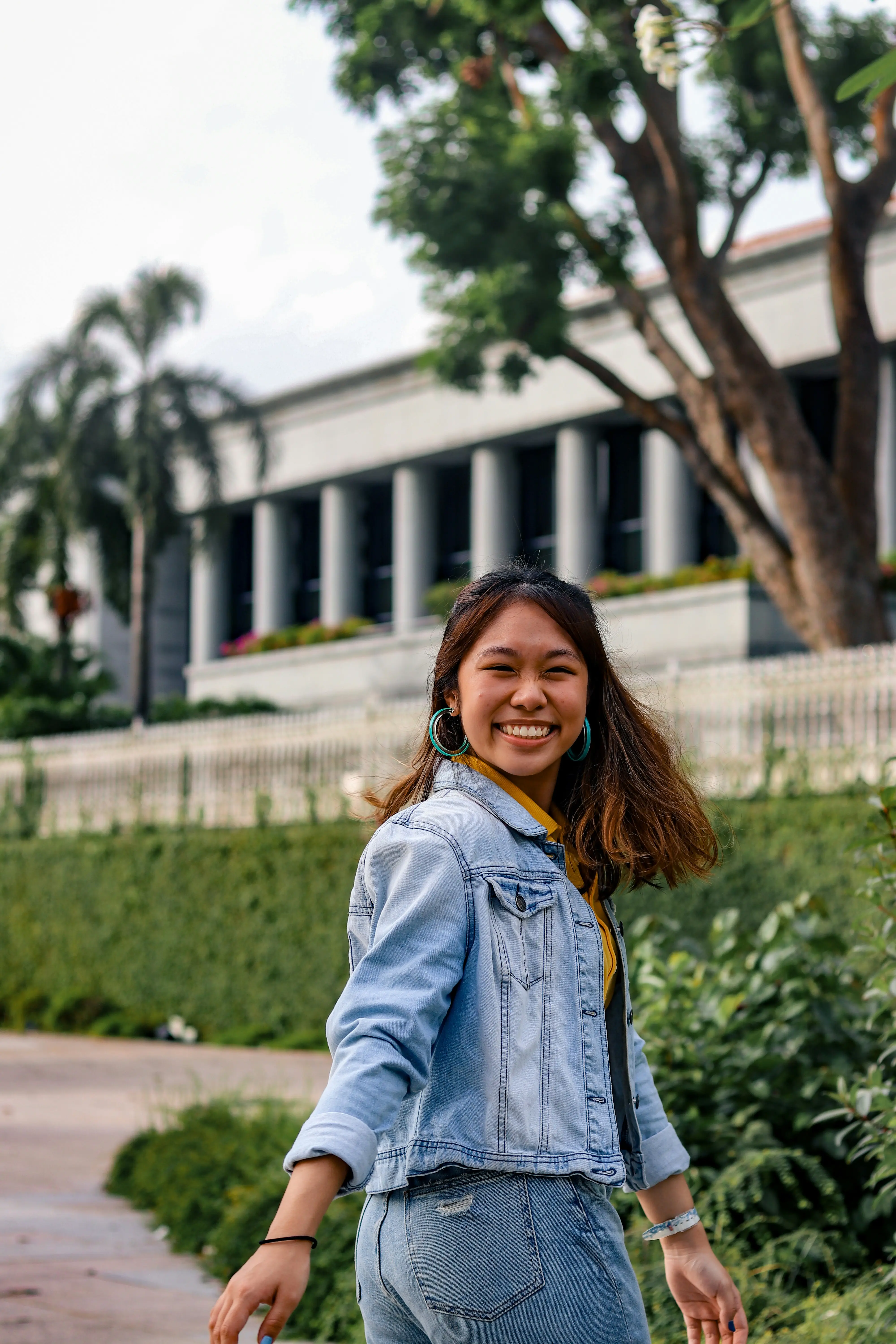 A prospective student in front of the campus they enquired about
