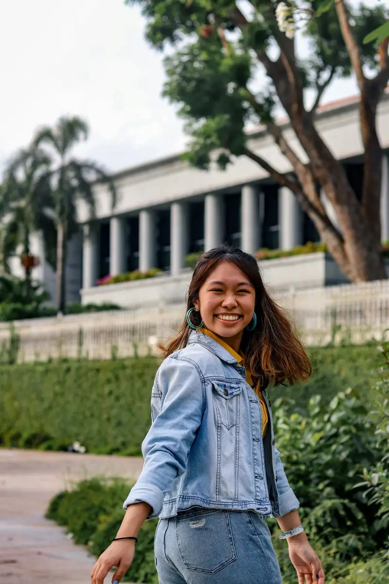 A prospective student in front of the campus they enquired about